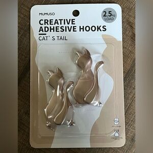 Creative adhesive Cat tail hooks. 2 in the pack. New with tags.